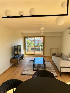 Posezení v ubytování Appartement L'ECRIN DES EMPEREURS