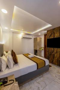 Postel nebo postele na pokoji v ubytování Hotel All In Homes - New Delhi Railway station- Paharganj