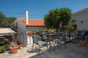 Patio nebo venkovní prostory v ubytování Athina Villas