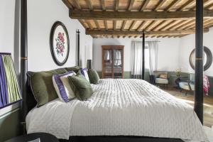 Ένα ή περισσότερα κρεβάτια σε δωμάτιο στο Villa Conti Galgani +41 φωτογραφίες