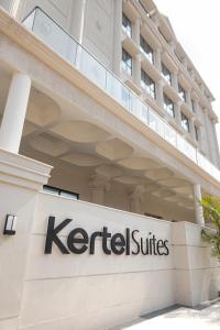 a logo of keratectos is pictured outside a building at Kertel Suites Kinshasa in Kinshasa