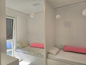 Ένα ή περισσότερα κρεβάτια σε δωμάτιο στο San Pietro Coastal Escape 287