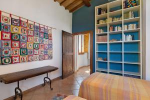 A bed or beds in a room at La Ripa - Appartamento I Ghiri