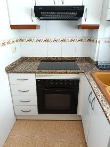 A kitchen or kitchenette at Seabreeze Lighthouse Apartment