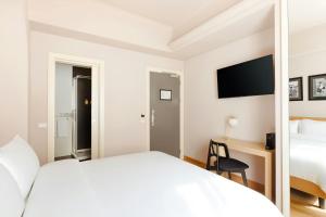 Posteľ alebo postele v izbe v ubytovaní Piazza Di Spagna Hotel, Sonder by Marriott Bonvoy
