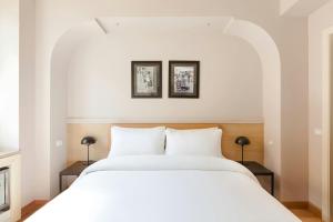 Posteľ alebo postele v izbe v ubytovaní Piazza Di Spagna Hotel, Sonder by Marriott Bonvoy