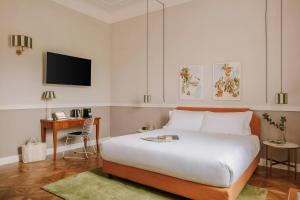 Postel nebo postele na pokoji v ubytování The Sonetto Hotel Santa Croce, Sonder by Marriott Bonvoy