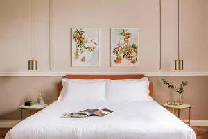 Postel nebo postele na pokoji v ubytování The Sonetto Hotel Santa Croce, Sonder by Marriott Bonvoy + 37 fotografií