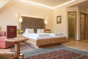 Łóżko lub łóżka w pokoju w obiekcie Hotel-Restaurant Kirchenwirt