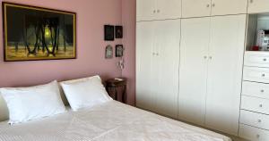 Postel nebo postele na pokoji v ubytování Sea Side Villa Alexandra