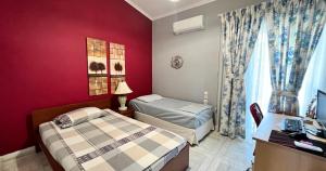 Postel nebo postele na pokoji v ubytování Sea Side Villa Alexandra
