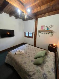 Postel nebo postele na pokoji v ubytování Hostel Cosmo