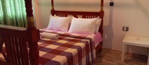Postel nebo postele na pokoji v ubytování Holiday Home Ragama
