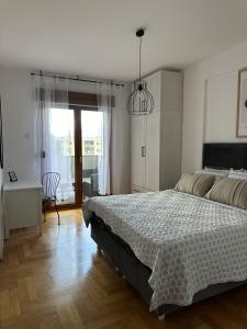 Ένα ή περισσότερα κρεβάτια σε δωμάτιο στο Apartment Sofi