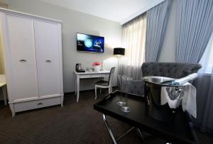 TV a/nebo společenská místnost v ubytování Alexandar Square Boutique Hotel