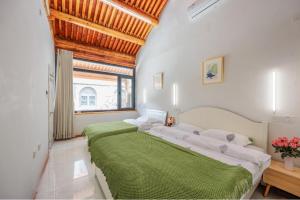 Gallery image of Great Wall Culture Home-stay in Xibozi