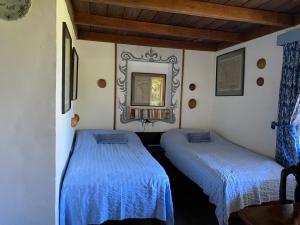 Postel nebo postele na pokoji v ubytování Hacienda Monteclaro