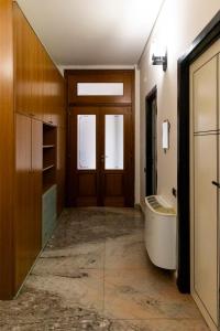 a hallway with a door and a tub in a room at Vesuvio Fantasy View in San Giuseppe Vesuviano +53 photos