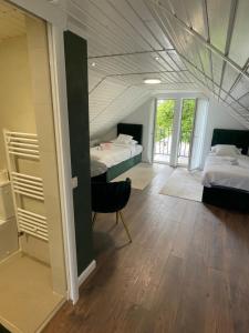 Giường trong phòng chung tại Casa Luca Ama Bran