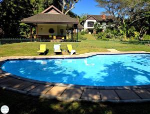 Swimmingpoolen hos eller tæt på Villa G6 - Selborne Golf Estate