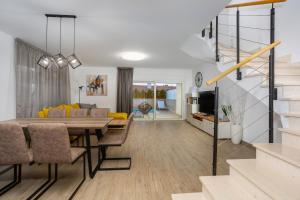 TV a/nebo společenská místnost v ubytování Villa Aurea