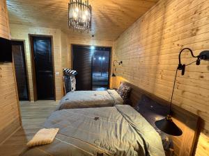 Billede fra billedgalleriet på Shtegu I Gjelber -Wood Rooms i Kukës + 4 billeder