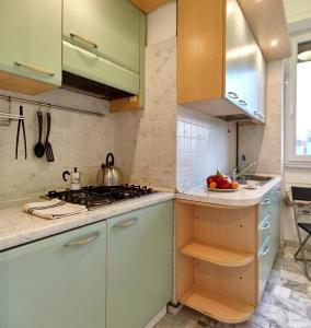 A kitchen or kitchenette at Farini Cozy Flat