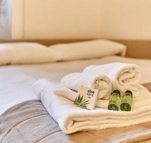 A bed or beds in a room at Farini Cozy Flat