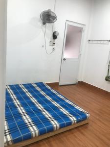 Postel nebo postele na pokoji v ubytování Minihouse Gia Phước