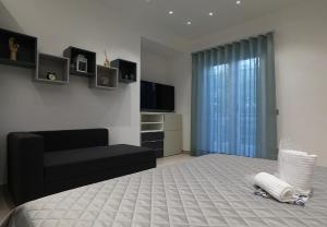 Postel nebo postele na pokoji v ubytování Borgo Alto B&B
