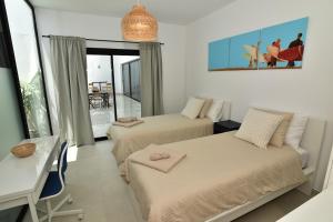 Ένα ή περισσότερα κρεβάτια σε δωμάτιο στο Villa Pitaya - Luxury Escape +54 φωτογραφίες