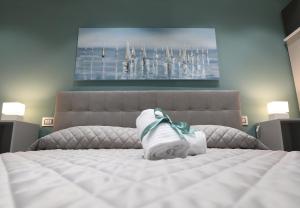 Postel nebo postele na pokoji v ubytování Borgo Alto B&B