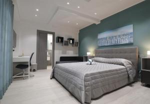 Postel nebo postele na pokoji v ubytování Borgo Alto B&B