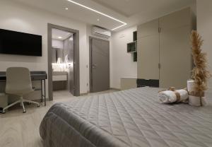 Postel nebo postele na pokoji v ubytování Borgo Alto B&B