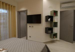 TV a/nebo společenská místnost v ubytování Borgo Alto B&B