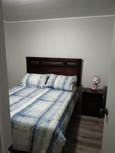 En eller flere senge i et værelse på Depto en Valparaíso centro 2