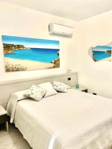 Postel nebo postele na pokoji v ubytování B&B I Colori Dell'Isola