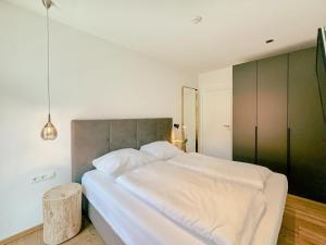 Postel nebo postele na pokoji v ubytování ZILLER DELIGHT - AlpenLuxus Collection + 34 fotografií