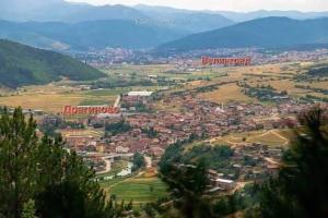 a view of a city with mountains in the background at Heaven in Draginovo