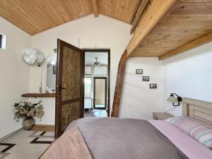 Postel nebo postele na pokoji v ubytování Kiketi Paradise
