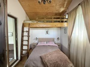 Postel nebo postele na pokoji v ubytování Kiketi Paradise