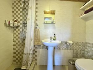 Koupelna v ubytování Kiketi Paradise + 20 fotografií