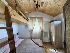 Postel nebo postele na pokoji v ubytování Kiketi Paradise
