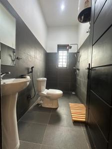 Koupelna v ubytování Bauhinia 21 Apartments + 23 fotografií