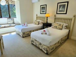 Ένα ή περισσότερα κρεβάτια σε δωμάτιο στο Villa G20 - Selborne Golf Estate
