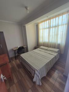 Postel nebo postele na pokoji v ubytování Habitación doble privada en Talara Centro
