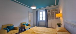 Postel nebo postele na pokoji v ubytování Casa Elena