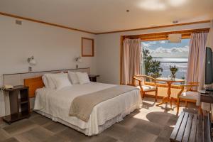 Postel nebo postele na pokoji v ubytování Hotel Elun, la mejor vista