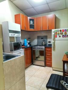 Kuchyň nebo kuchyňský kout v ubytování Sweet Home tu hogar en Cusco