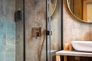 Ein Badezimmer in der Unterkunft VSG Resort - Apartments 200m from Beach, Pool, Sauna & Jacuzzi